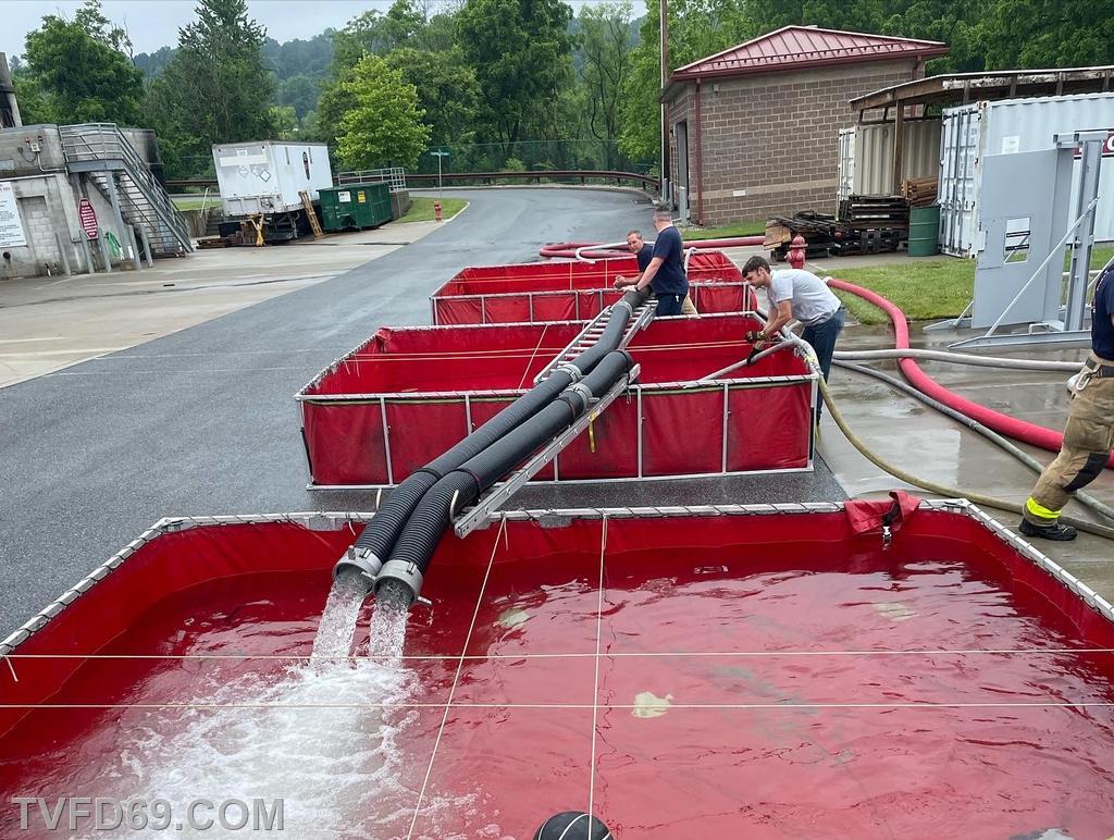 during the mobile water supply practical day, units from across Chester county set up 3 portable tanks, utilizing hard sleeve hose and jet siphons to transfer the water between them.